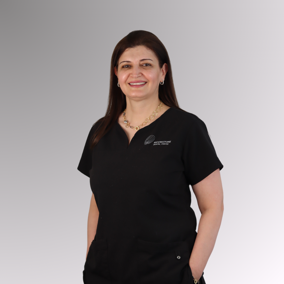 Dr. Ban Abdul Rahman with the Moonstone Dental Centre team